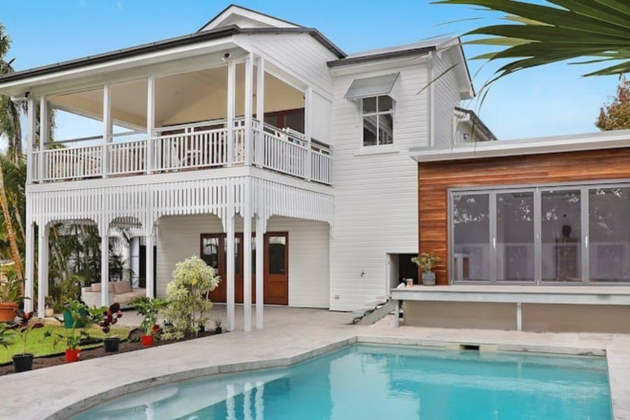 Tight crop of pool house exterior before generative expand